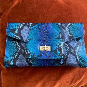 Alexis Hudson blue snakeskin clutch